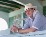 KINGSTON, JAMAICA - MARCH 10: Former England Cricket Captain Tony Greig poses during the England net practice at the Sabina Park Cricket Ground on March 10, 2004 in Kingston, Jamaica. (Photo by Tom Shaw/Getty Images)